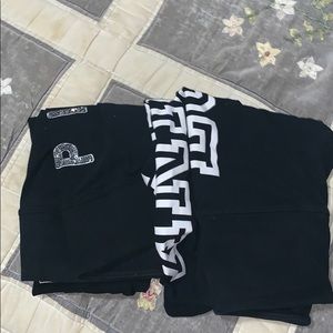 two pairs of pink leggings